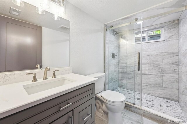 1112-11121/2 Krameria St, Denver, CO 80220 - full bath featuring vanity and a stall shower