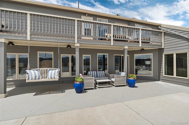 369 County Road 4051, Granby, CO 80446 - rear view of house featuring an outdoor living space, a patio area, and a balcony