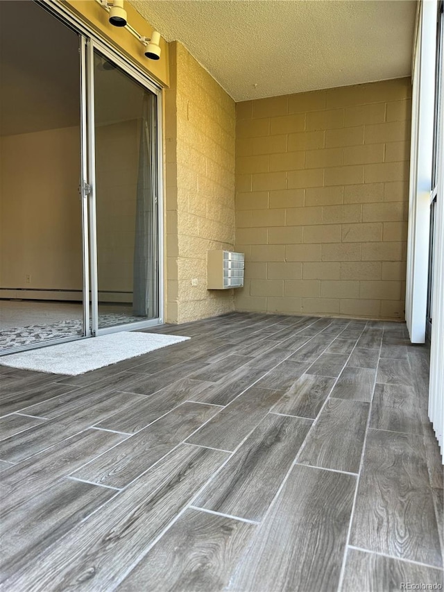 view of patio / terrace featuring heating unit