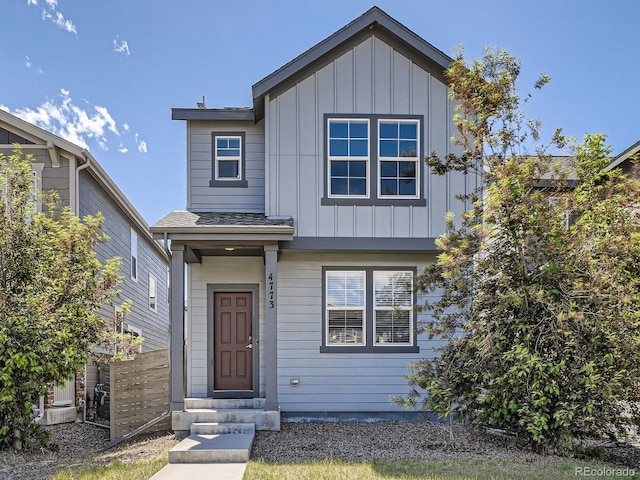 4773 Kittredge St, Denver, CO 80239 - view of front of house with board and batten siding