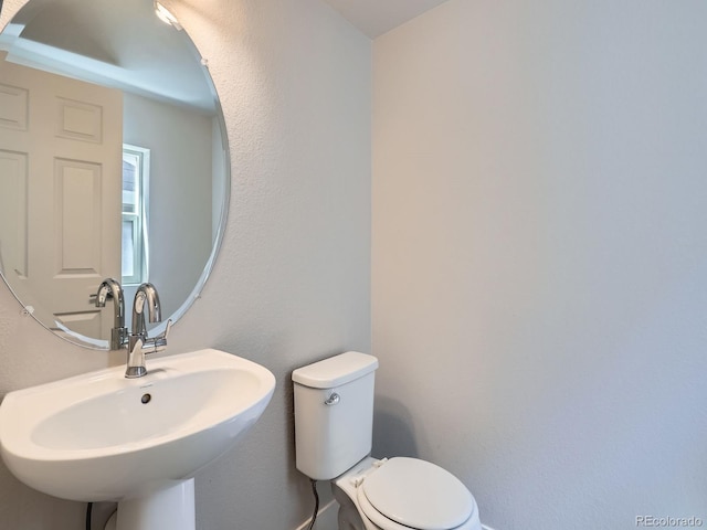 4773 Kittredge St, Denver, CO 80239 - bathroom with a sink and toilet