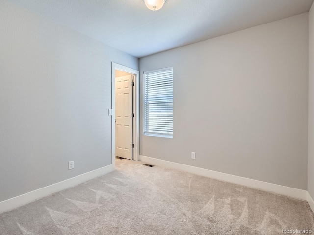 4773 Kittredge St, Denver, CO 80239 - spare room featuring light colored carpet and baseboards