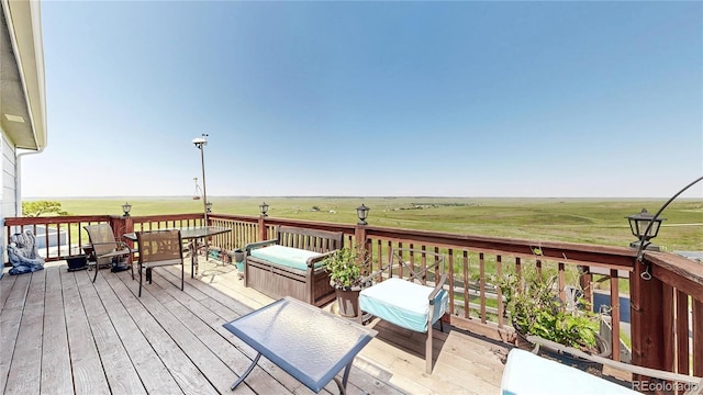40291 Gold Nugget Dr, Deer Trail, CO 80105 - wooden deck with outdoor dining area