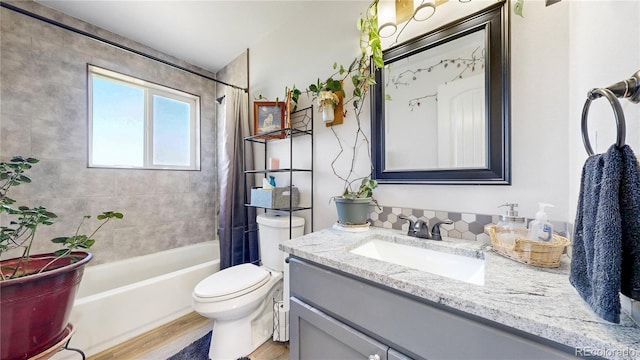 40291 Gold Nugget Dr, Deer Trail, CO 80105 - full bathroom featuring vanity, shower / bath combo, and wood finished floors