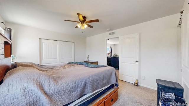 40291 Gold Nugget Dr, Deer Trail, CO 80105 - bedroom with light colored carpet, a closet, and a ceiling fan