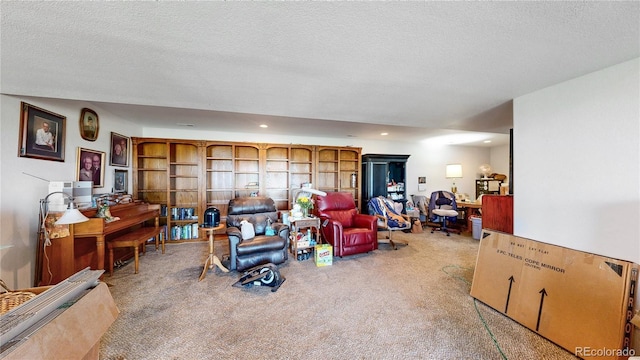 40291 Gold Nugget Dr, Deer Trail, CO 80105 - living area featuring light carpet, a textured ceiling, and recessed lighting