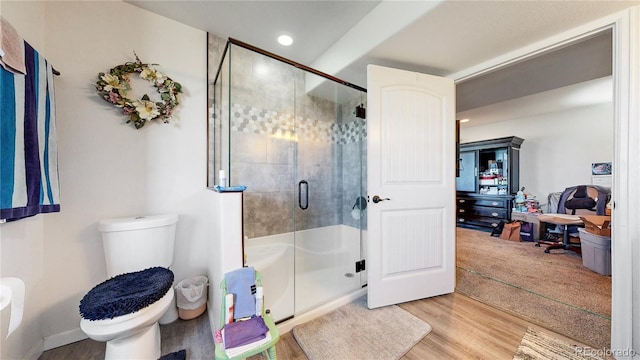 40291 Gold Nugget Dr, Deer Trail, CO 80105 - bathroom featuring a shower with door, wood finished floors, and recessed lighting