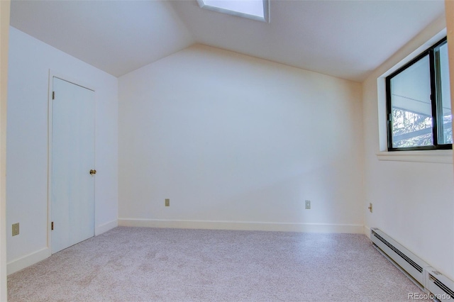1172 Juniper Ave, Boulder, CO 80304 - bonus room featuring a baseboard heating unit, vaulted ceiling, and carpet