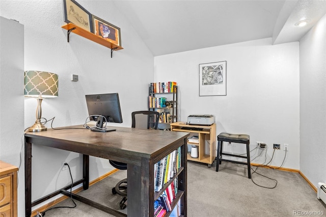 1732 Lansing St, Aurora, CO 80010 - carpeted office featuring vaulted ceiling and a baseboard heating unit