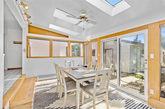 1732 Lansing St, Aurora, CO 80010 - sunroom / solarium with a skylight, vaulted ceiling, and a baseboard radiator