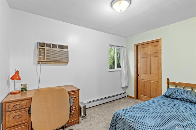 1732 Lansing St, Aurora, CO 80010 - bedroom with a baseboard radiator, light carpet, an AC wall unit, and an office area