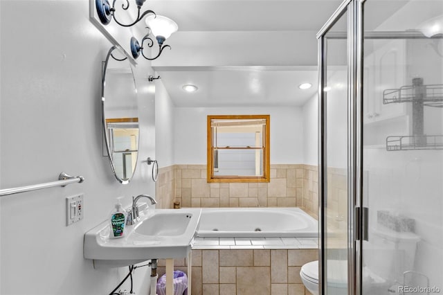 1732 Lansing St, Aurora, CO 80010 - bathroom with a jetted tub and a shower stall