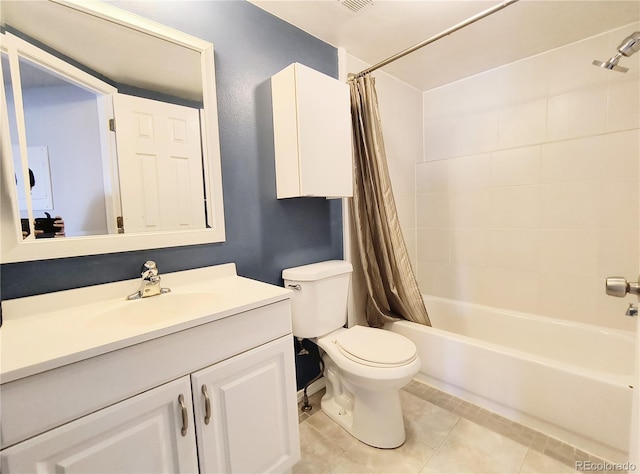 full bath featuring tile patterned floors, vanity, toilet, and shower / tub combo with curtain