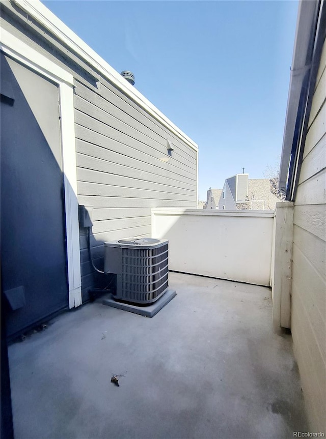 view of patio / terrace with a balcony and central AC