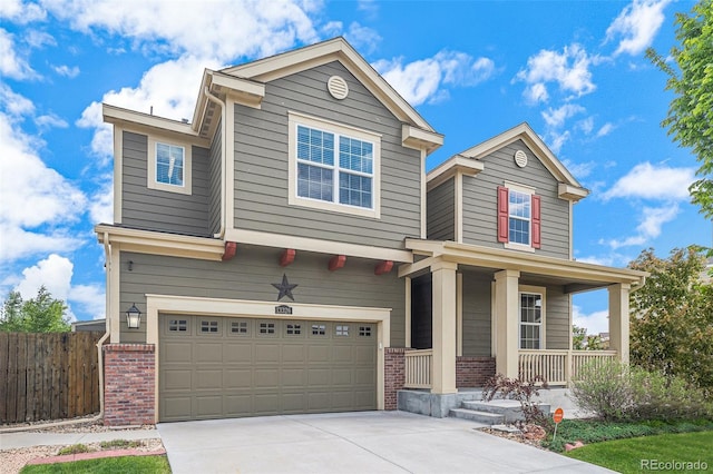 13326 Olive Way, Thornton, CO 80602 - view of front of house with a garage, brick siding, a porch, and concrete driveway