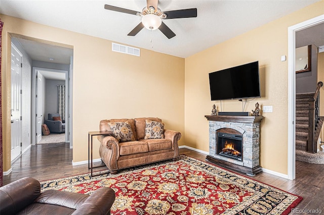 13326 Olive Way, Thornton, CO 80602 - living room featuring stairway, a ceiling fan, wood finished floors, and baseboards