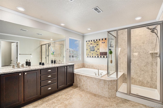 13326 Olive Way, Thornton, CO 80602 - full bath featuring crown molding, a bath, a stall shower, double vanity, and a textured ceiling