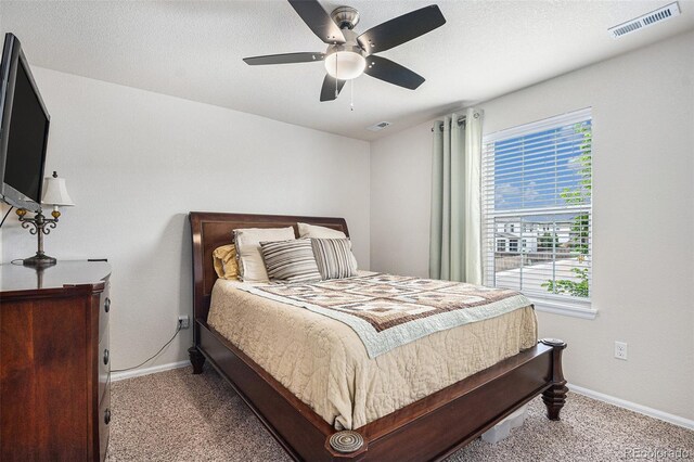 13326 Olive Way, Thornton, CO 80602 - carpeted bedroom with baseboards and ceiling fan