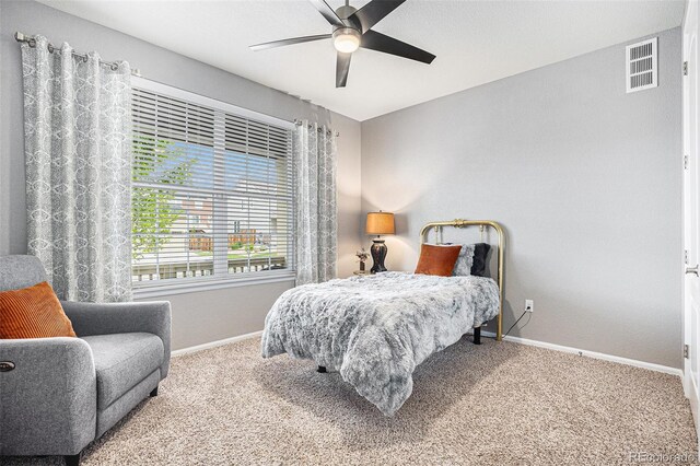 13326 Olive Way, Thornton, CO 80602 - carpeted bedroom with baseboards and a ceiling fan