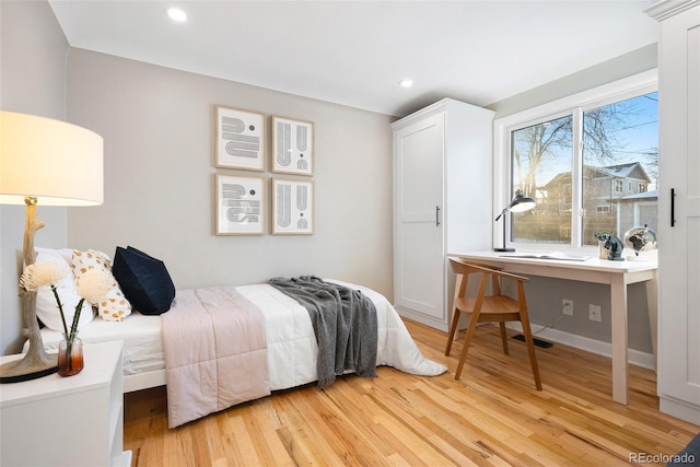 bedroom featuring light wood-type flooring