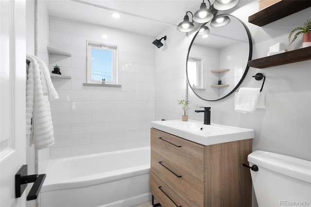 bathroom featuring shower / bathtub combination, vanity, and toilet