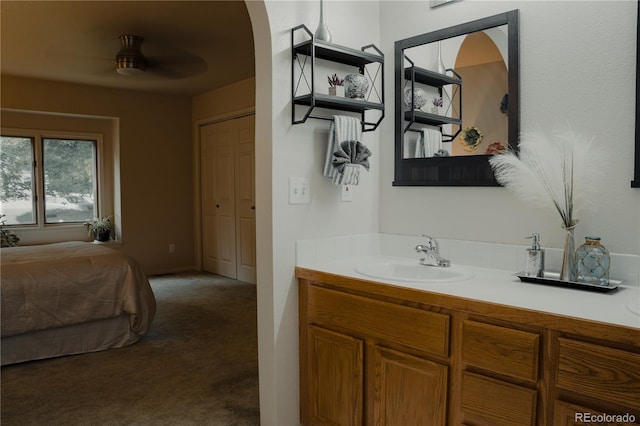 bathroom with vanity and ceiling fan