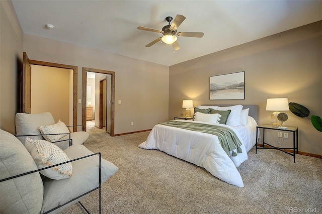 carpeted bedroom featuring a ceiling fan and baseboards