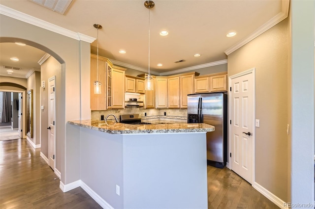 10127 Bluffmont Ln, Lone Tree, CO 80124 - kitchen with stainless steel appliances, arched walkways, light brown cabinetry, ornamental molding, and light stone countertops