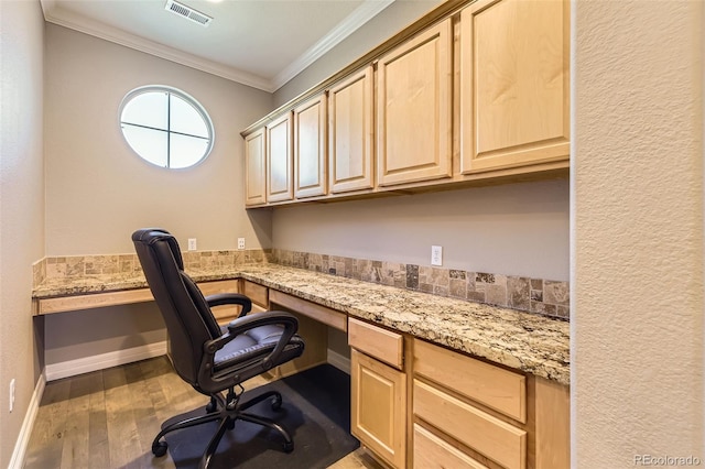 10127 Bluffmont Ln, Lone Tree, CO 80124 - unfurnished office featuring built in desk, crown molding, and wood finished floors