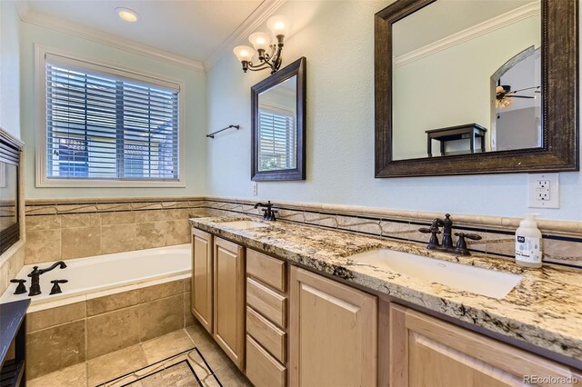 10127 Bluffmont Ln, Lone Tree, CO 80124 - full bath with double vanity, crown molding, a garden tub, ceiling fan, and a chandelier