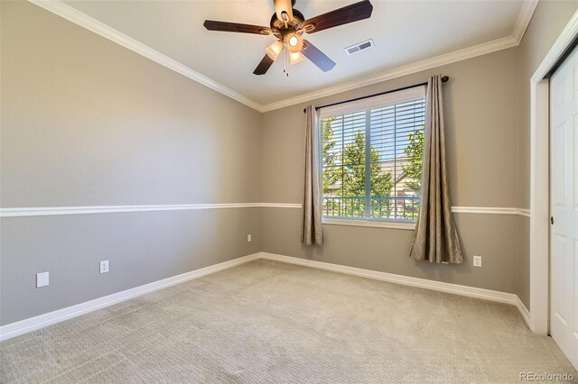 10127 Bluffmont Ln, Lone Tree, CO 80124 - empty room featuring light carpet, a ceiling fan, and crown molding