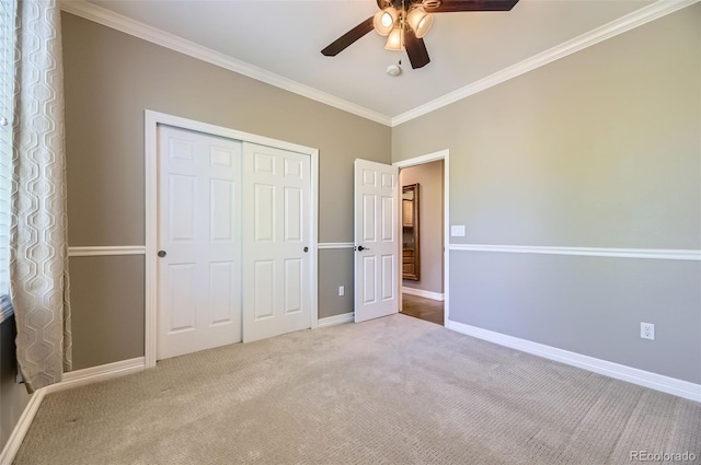 10127 Bluffmont Ln, Lone Tree, CO 80124 - unfurnished bedroom featuring ornamental molding, carpet, a closet, and ceiling fan