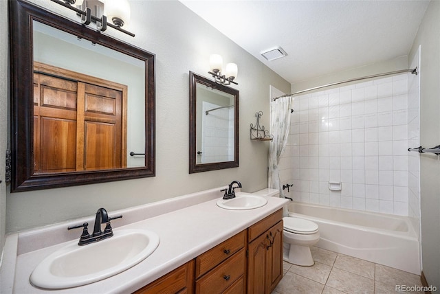 44 Conestoga Ct, Bailey, CO 80421 - bathroom featuring double vanity, toilet, tile patterned flooring, and shower / bathtub combination with curtain