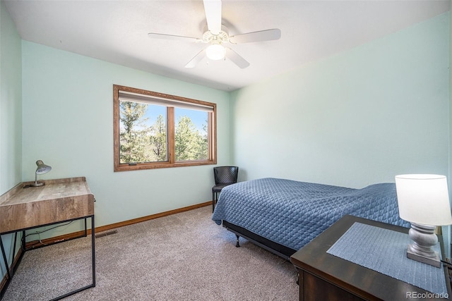 44 Conestoga Ct, Bailey, CO 80421 - carpeted bedroom with baseboards and a ceiling fan