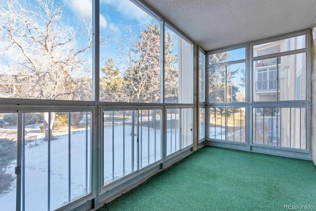 unfurnished sunroom with a healthy amount of sunlight