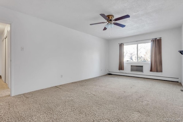 carpeted empty room featuring a baseboard heating unit, a textured ceiling, an AC wall unit, and ceiling fan