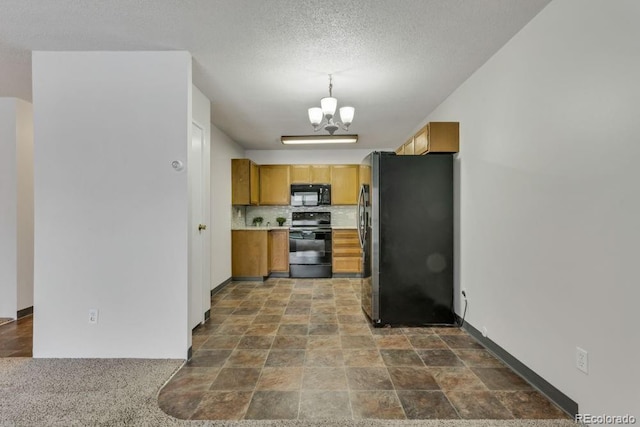 kitchen featuring an inviting chandelier, backsplash, black appliances, a textured ceiling, and decorative light fixtures