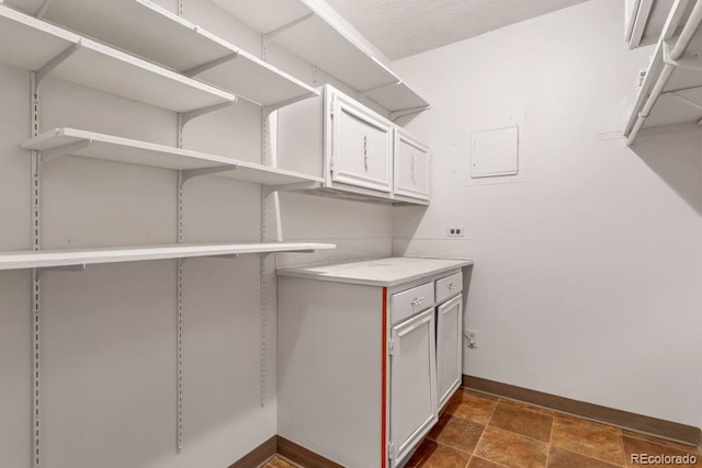 clothes washing area with electric dryer hookup