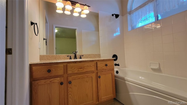 full bathroom featuring vanity and bathtub / shower combination