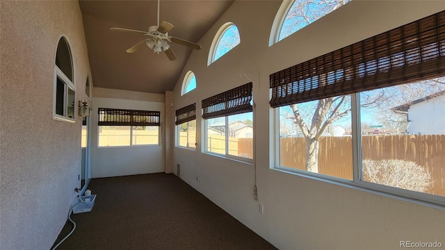 unfurnished sunroom featuring a wealth of natural light