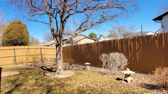 view of yard featuring fence