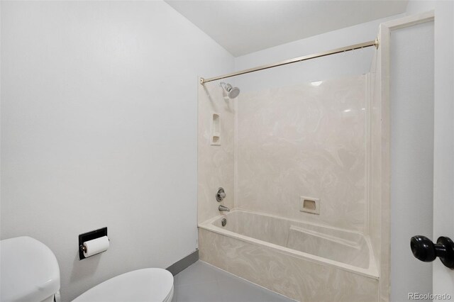 full bath featuring shower / bathing tub combination, toilet, and tile patterned floors