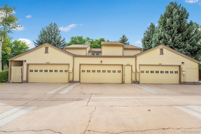 view of front of home with a garage and driveway