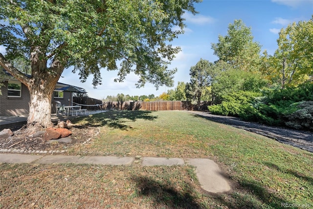 view of yard with fence