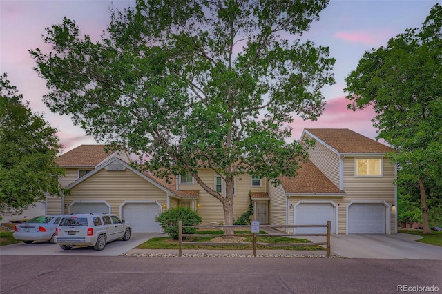 461 S Kalispell Way Unit D, Aurora, CO 80017 - view of front of property featuring driveway and an attached garage