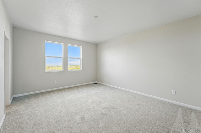 9374 Quartz St, Arvada, CO 80007 - unfurnished room with light carpet and baseboards