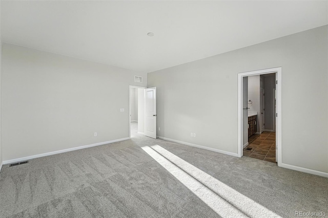 9374 Quartz St, Arvada, CO 80007 - unfurnished bedroom with carpet flooring, baseboards, and ensuite bath