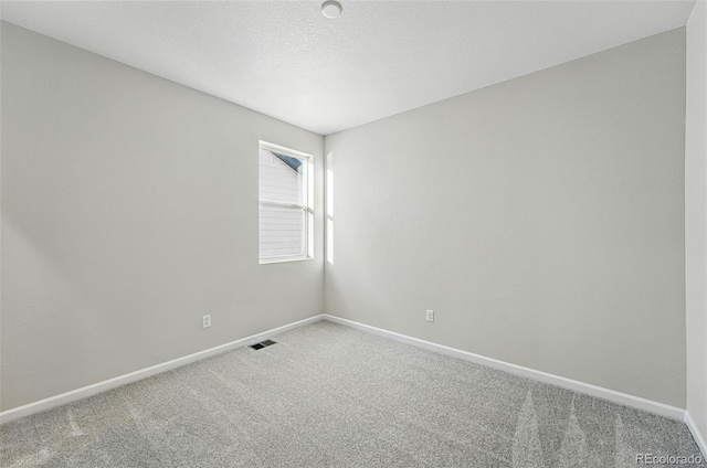 9374 Quartz St, Arvada, CO 80007 - carpeted empty room with baseboards