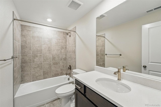 9374 Quartz St, Arvada, CO 80007 - full bathroom with vanity, toilet, shower / bath combination, and tile patterned floors