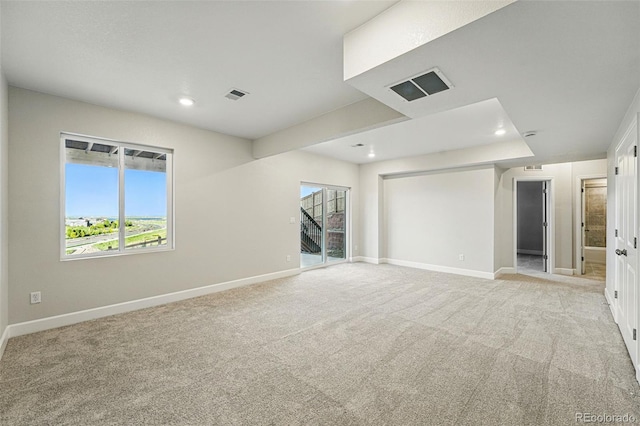 9374 Quartz St, Arvada, CO 80007 - unfurnished room with baseboards, light carpet, and recessed lighting